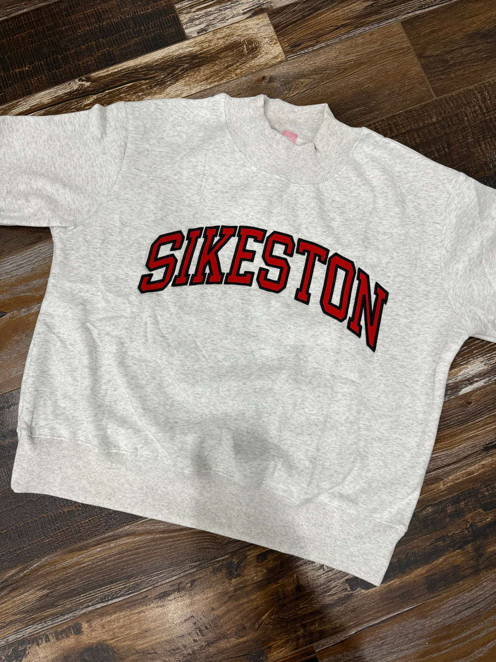 Sikeston Embroidered Appliqué Mock Neck
