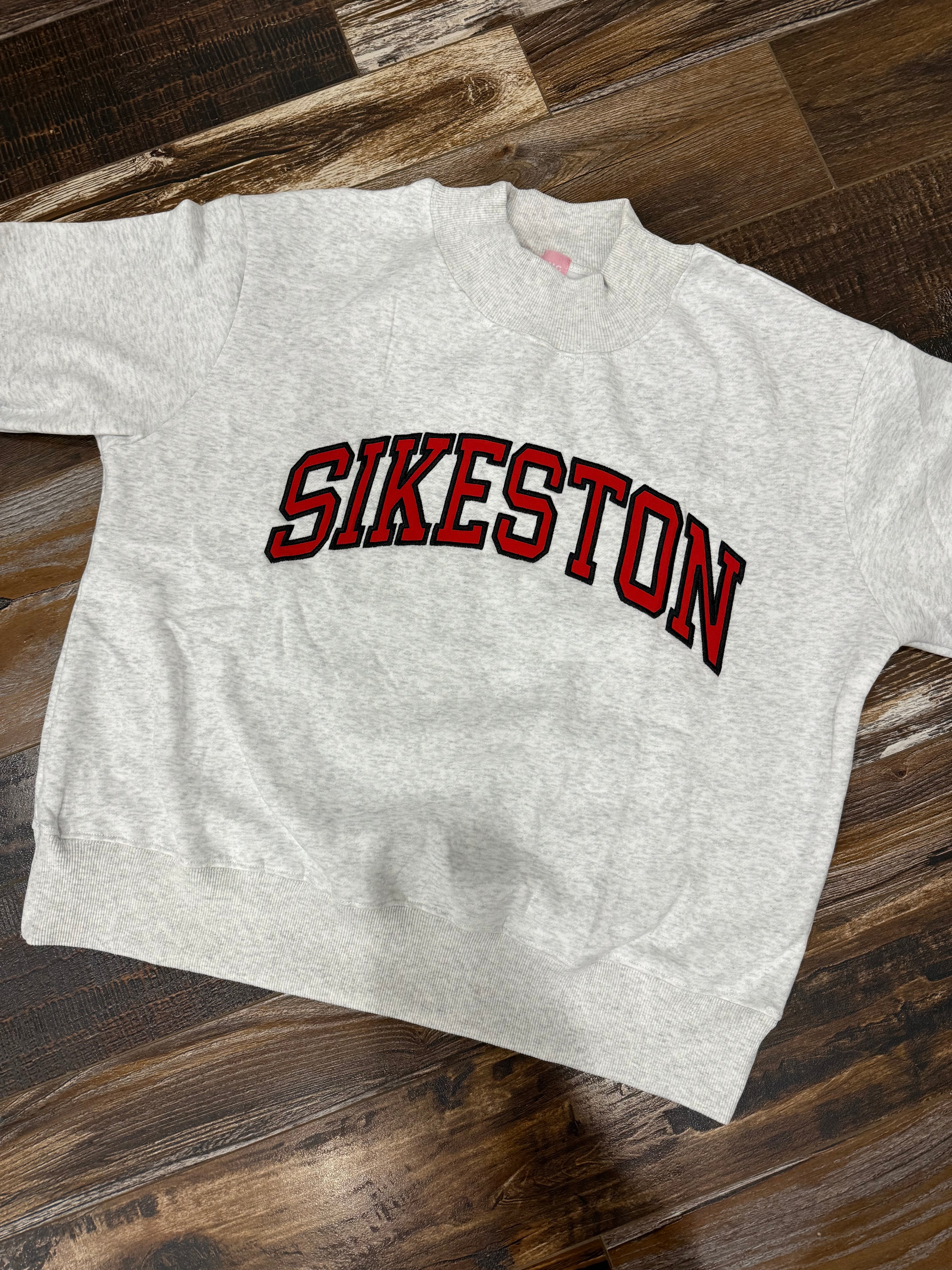 Sikeston Embroidered Appliqué Mock Neck