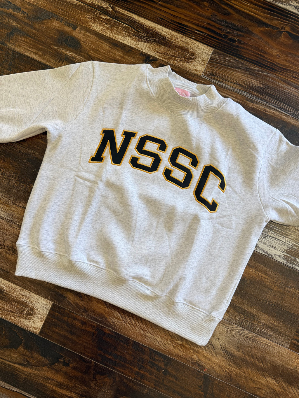 NSSC Appliqué Embroidered Mock Neck