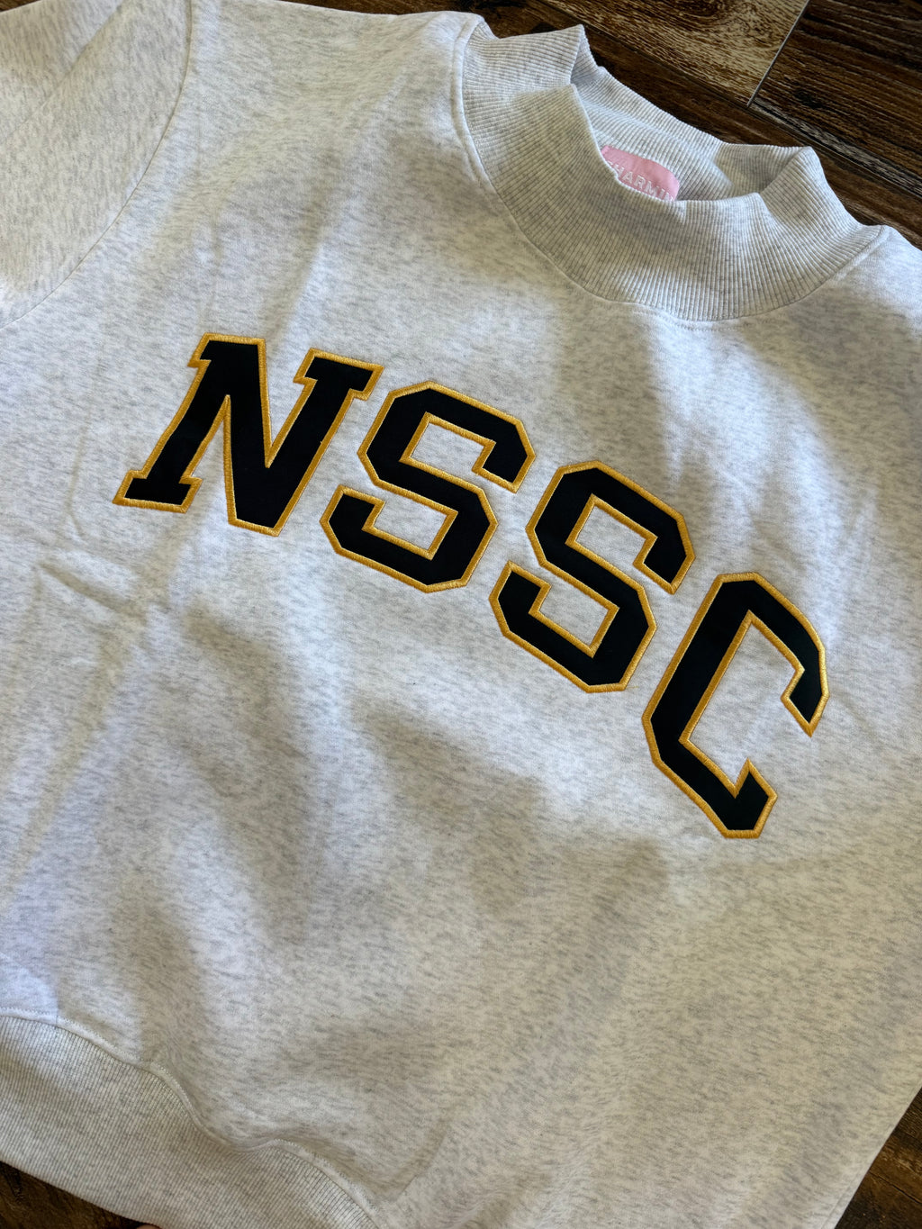 NSSC Appliqué Embroidered Mock Neck
