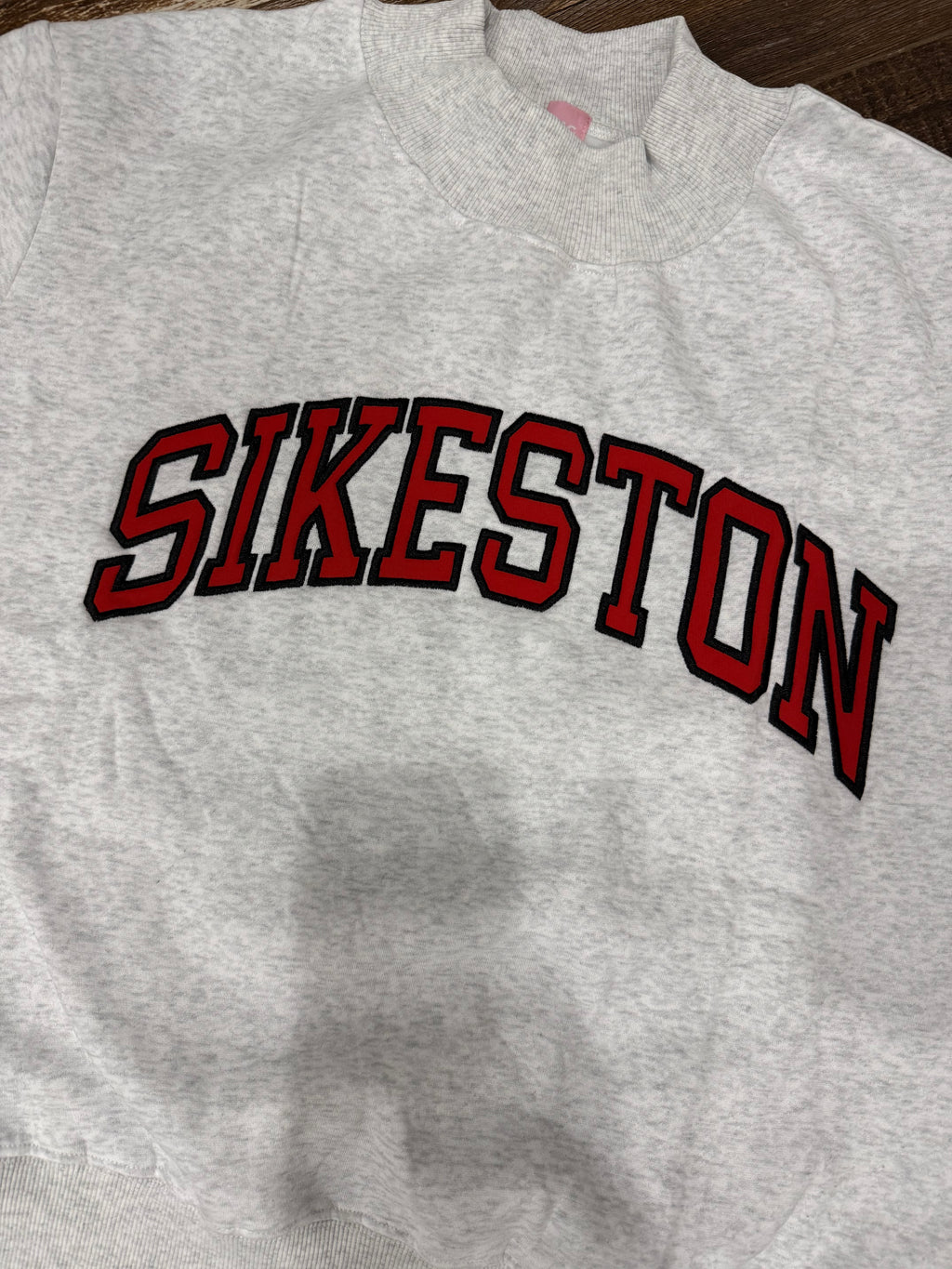 Sikeston Embroidered Appliqué Mock Neck