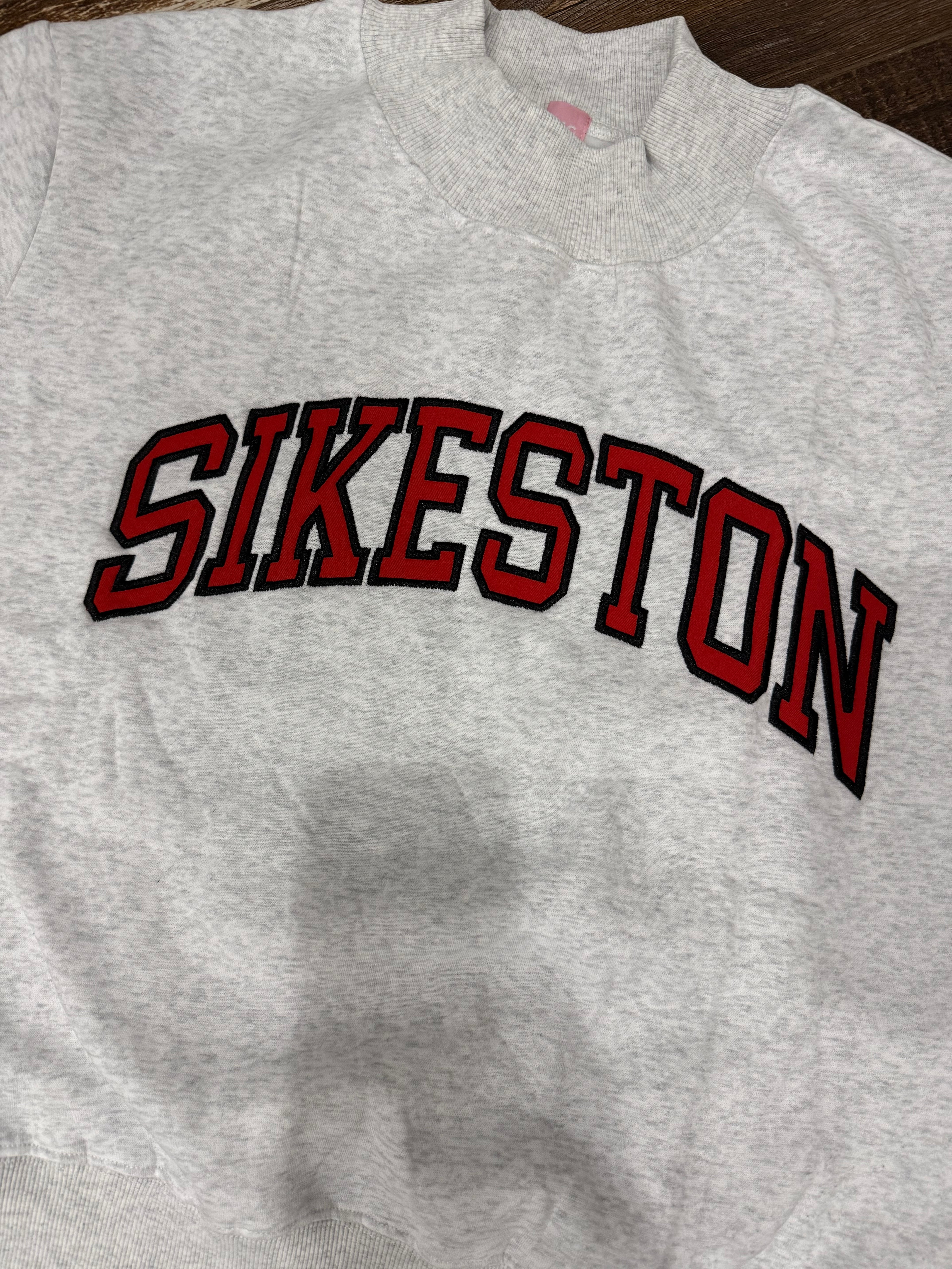 Sikeston Embroidered Appliqué Mock Neck