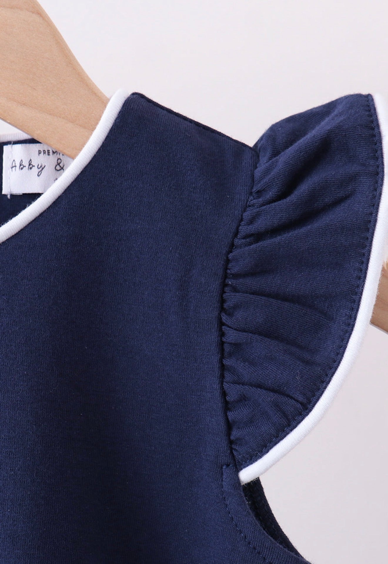 Navy Flutter Sleeve Scallop Top